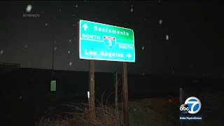 CHP escorts traffic through the Grapevine due to snowfall