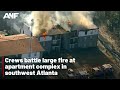 Crews battle large fire at apartment complex in southwest Atlanta