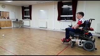 David Smith OBE demonstrates the precision needed to play boccia