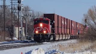 The southbound CPKC Altona way freight and westbound CN intermodel cross SJJ. 2/21/25.