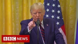 Donald Trump argues with reporter over Ukraine question - BBC News