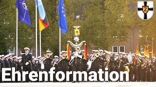 Honorary formation of the German Navy marches with troop flag to march \