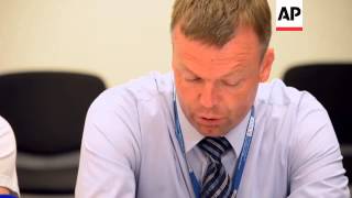 OSCE team returns from MH17 crash site, news briefing; Dutch/Australian police comment
