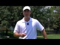 golf tip how to hit from a downhill lie