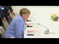 shinzo abe meets angela merkel at the osaka g20 summit