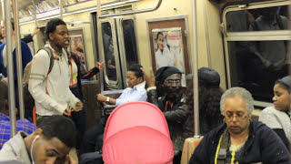 Fight on  A-Train (Brooklyn NYC) Ratchet Chick vs Street Poet