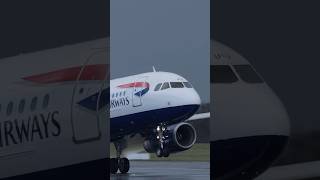 BA A320 creates a beautiful spray on the runway #4k #aviation #planespotting #avgeek #planes