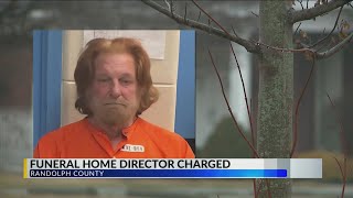 Former Indiana funeral home director arrested