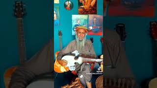 afghani rabab play by an old man