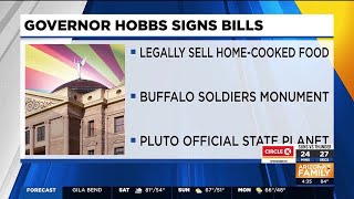 Gov. Hobbs signs Tamale Bill into law, makes Pluto official state planet