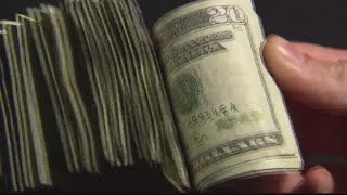 When should Georgia surplus tax refund checks start arriving?