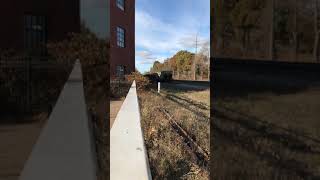 NS 8144 and NS 7712 pull an NS manifest train through Cleveland OH