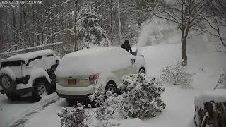 SnowJoe 100 volt snowblower powering through heavy wet snow with ease and throwing it far!