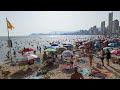 benidorm s beautiful levante beach 4k sunshades in every colour europe s no.1 holiday resort busy