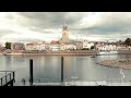 aerial of hanseatic medieval city deventer the netherlands from the other side of the ijssel river