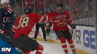 Canada's Sam Bennett Roofs Equalizer Past Connor Hellebuyck