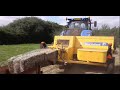 ROWING UP HAY FOR THE BALER