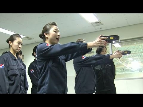 Korean Air Lines crews get trained with stun guns Korean Air Lines crews get trained with stun guns