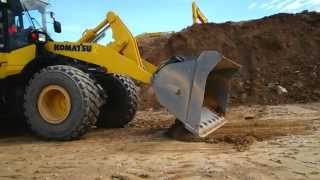 HST wheel loader kwick tips: electronically controlled suspension system