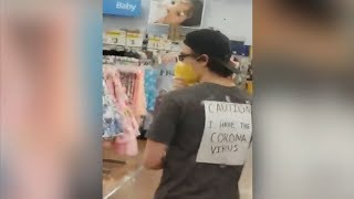 'I have the Coronavirus': Man wearing sign sprays Lysol on merchandise at Walmart