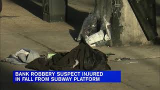 Bank robbery suspect critically injured in fall from subway platform in Queens