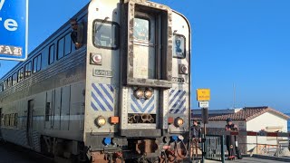 AMTK 6907 Cab Car leads Northbound Amtrak 587 through San Clemente, CA on 06/27/2024