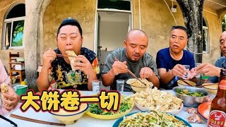 海南三亚太热了，烙春饼吃，大饼卷一切，看看小三轮吃了多少个？