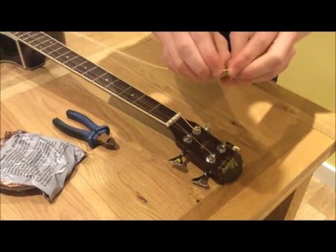 How To Restring (Change Strings On) an Acoustic Bass Guitar How To Restring (Change Strings On) an Acoustic Bass Guitar