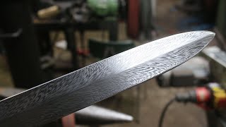 Forging a feather Damascus dagger, the complete movie.