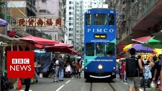 Hong Kong artist photographs city's tram system - BBC News