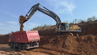 Volvo EC480D L loading Mercedes-Benz Actros trucks part 1