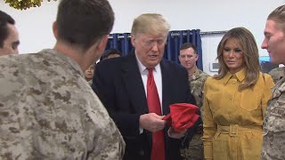 Why Trump Is in Trouble for Signing Soldier’s MAGA Hat