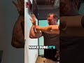 kamil jablonski shows devon larratt how to pose with forearms