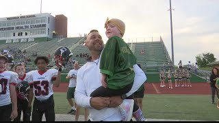 Riley kid cheers on Westfield Middle School football team