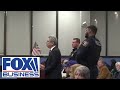 Edison, NJ resident removed from town meeting for waving American flag protests 'prop' ban