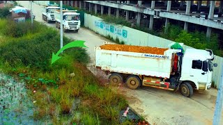 First filling land! Dump truck 25ton with Bulldozer Komatsu push soil delete water huge project De..