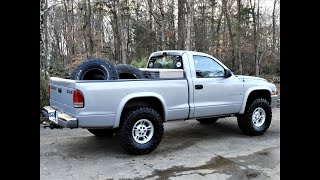 HOW TO INSTALL 33 MUD TARS ON 99 DAKOTA 4X4 AWESOME