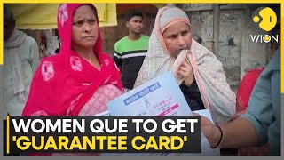 India: Women line up at UP Congress office for 'guarantee card' of Rs 1 lakh | L