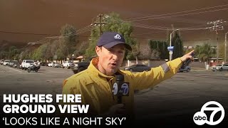 Reporter shows ground view of Hughes Fire: 'Looks like a night sky'