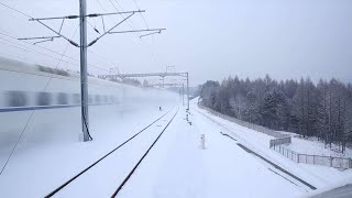 GLOBALink | China's bullet trains battle blizzards in NE China