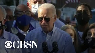 Biden issues warning on climate change after touring Ida damage
