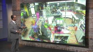 Surveillance video shows Hillsborough County robbery suspect stabbed by cashier clerk