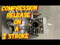 DOES A 2CYCLE ENGINE HAVE A COMPRESSION RELEASE?