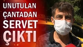 Taksisinde çanta buldu, içinden servet çıktı!