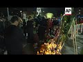 Mourners gather at vigil for shooting victims