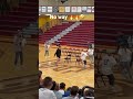 Guy pulls chair in musical chairs during high school assembly