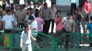 Han Chinese protest in tense Xinjiang city