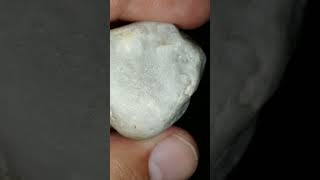 Low quality rough white sapphire.