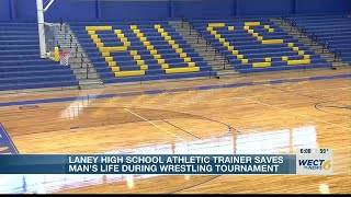 High school athletic trainer saves a life by performing CPR at wrestling tournament