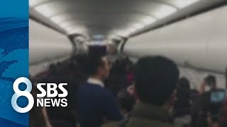 폭설로 12시간 기내 대기…제주공항, 오늘도 지연 속출 / SBS